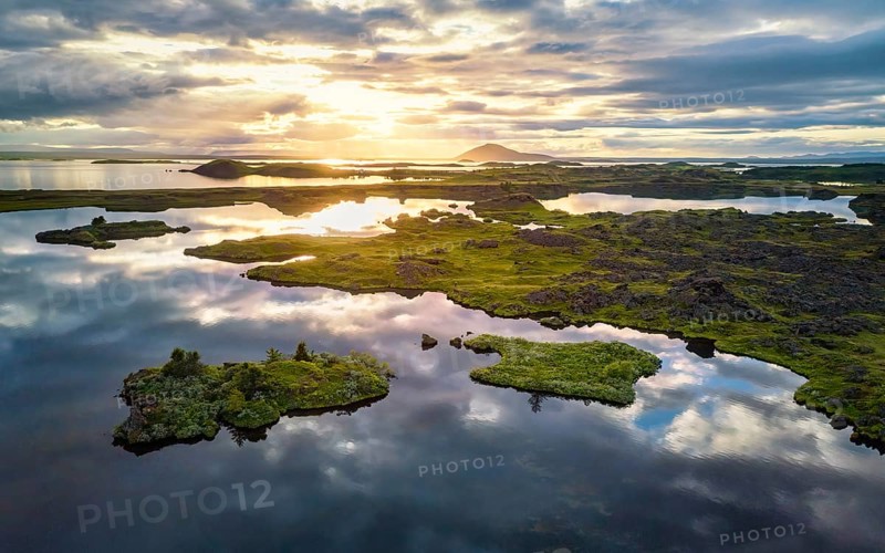 Aerial view of small green islands in the lake