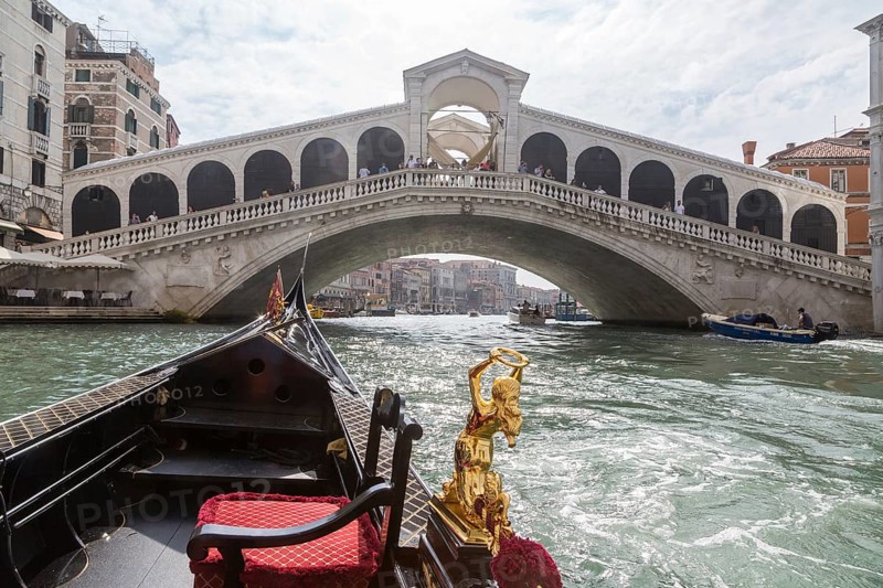 View from Venetian gondola on Rialto Bridge and Canal Grande
