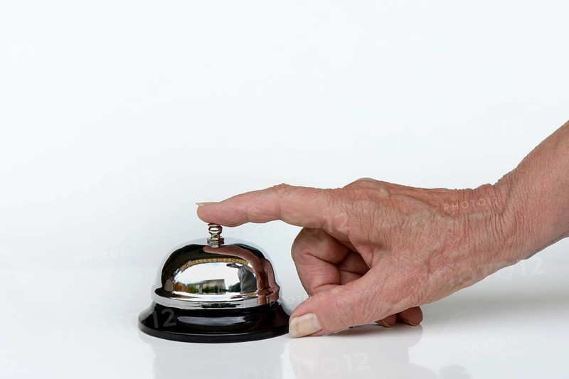 Hand rings table bell