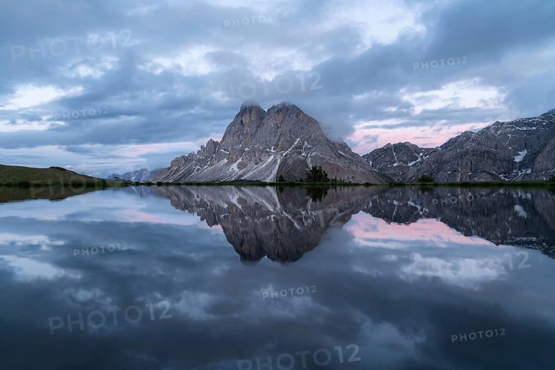 Peitlerkofel with reflection in small lake