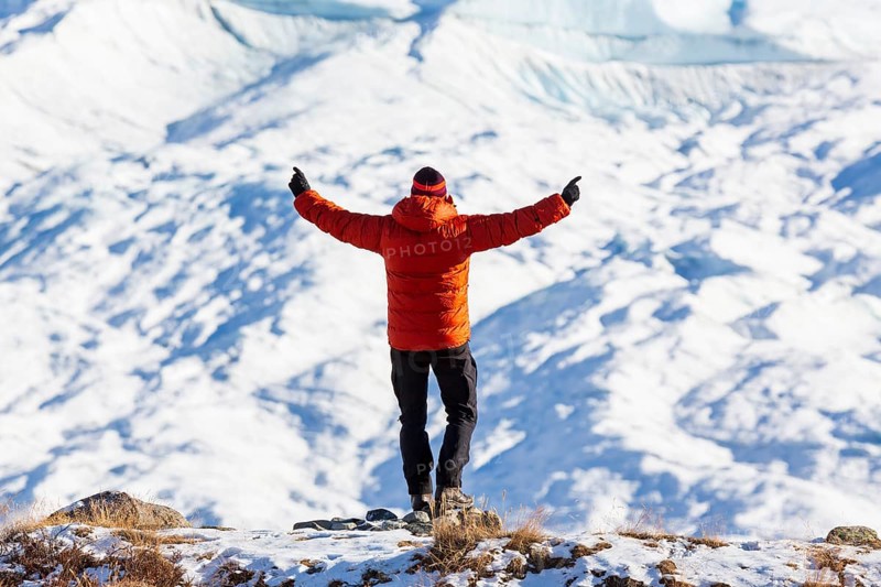 Man looking at inland ice near Kangerlussuaq