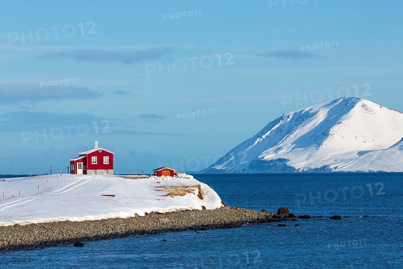 Lonely red house on the Akureyrifjord
