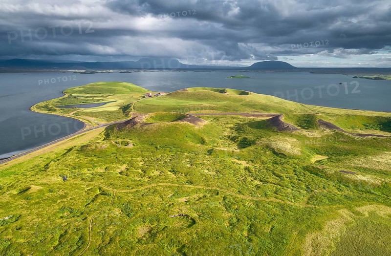 Aerial view of green volcanic crater