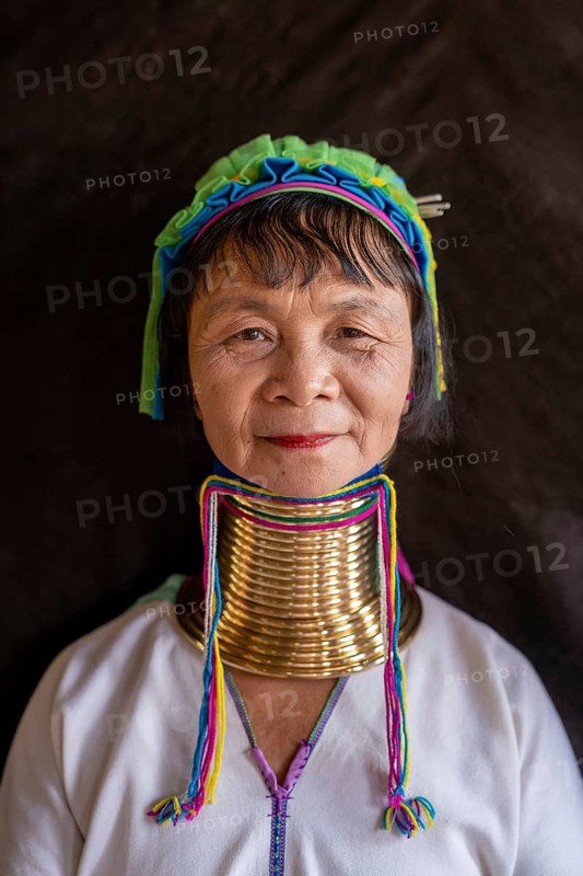 Long necked woman with several brass rings around her neck