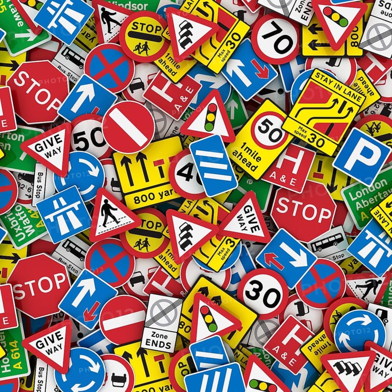 3D illustration of British road signs like stop signs