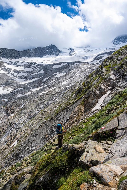 Hiker on marked hiking trail