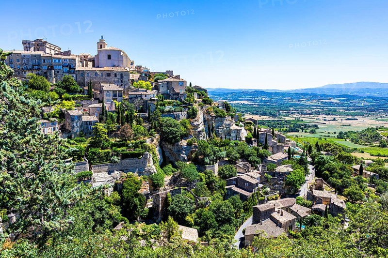 Nested houses of the mountain village of Cordes with castle and church on the top