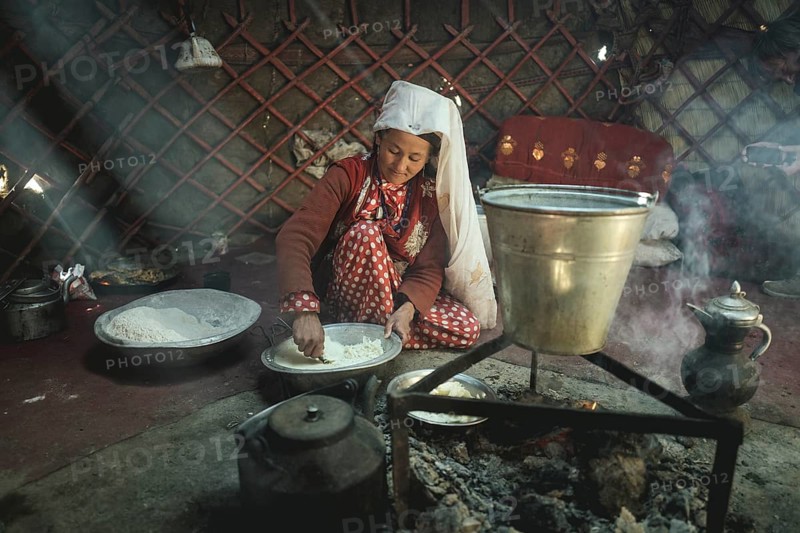 Woman stirring dough