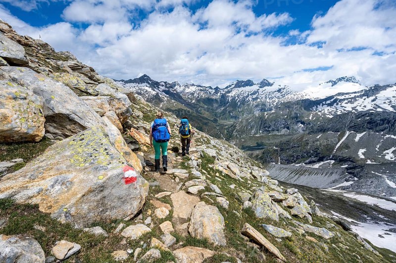 Hiker on marked hiking trail