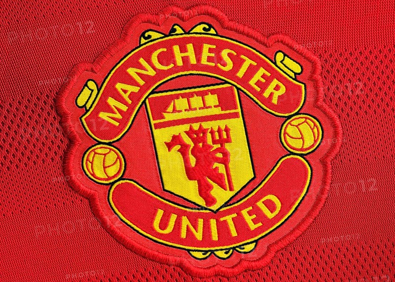 Manchester United badge on a football shirt