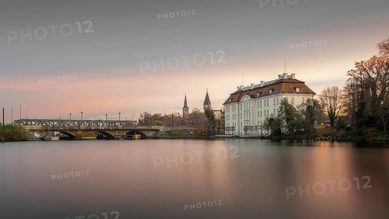 View over the Dahme River to the Koepenick Castle and the Lange Bruecke in Berlin in the morning