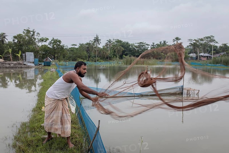 Man casts net