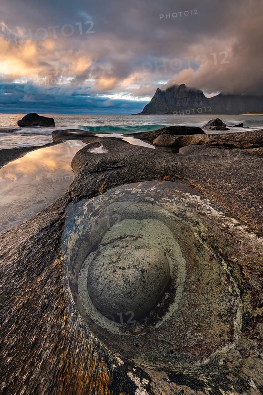 Rocks on the beach of Uttakleiv at evening light