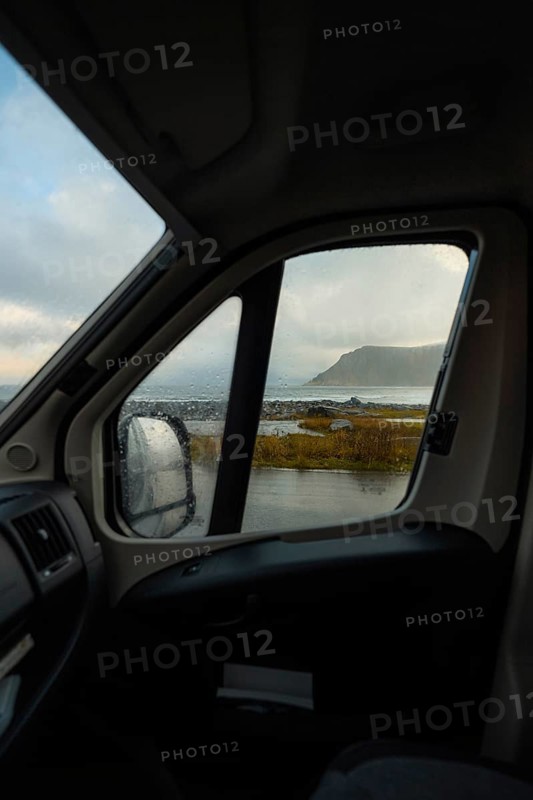 View from a rainy campervan window on Flakstad beach