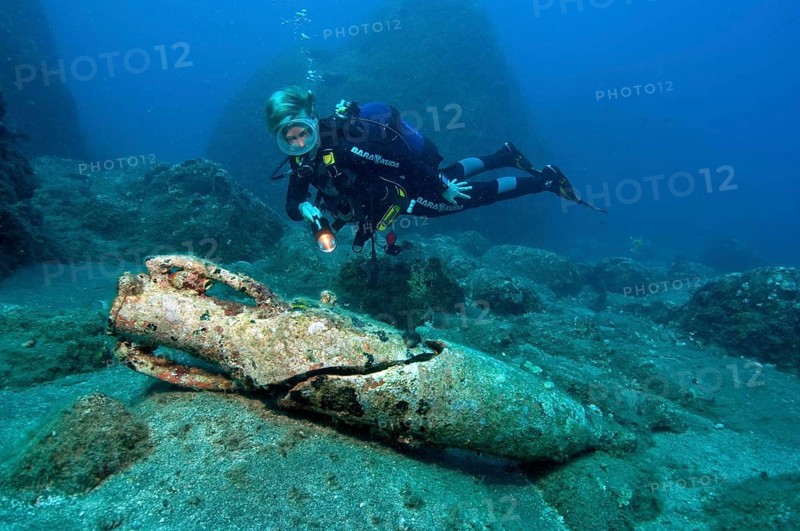 Divers and antique amphora type Dressel 2-4