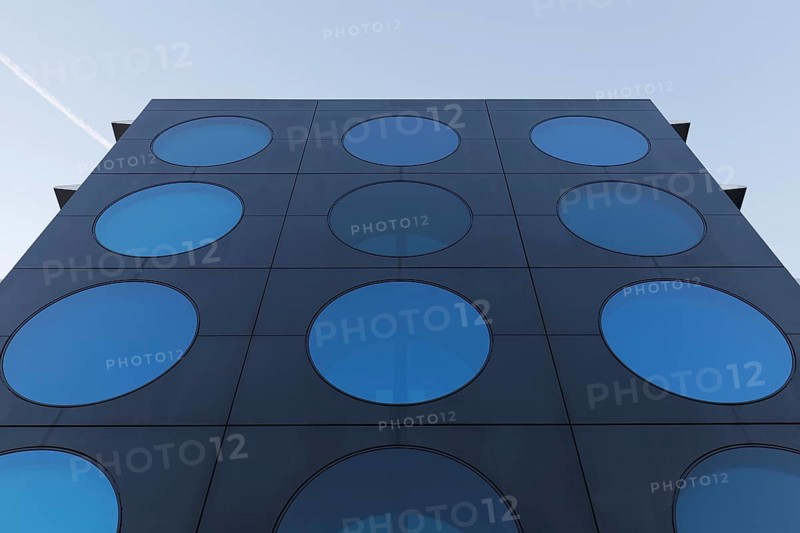 Facade with blue portholes