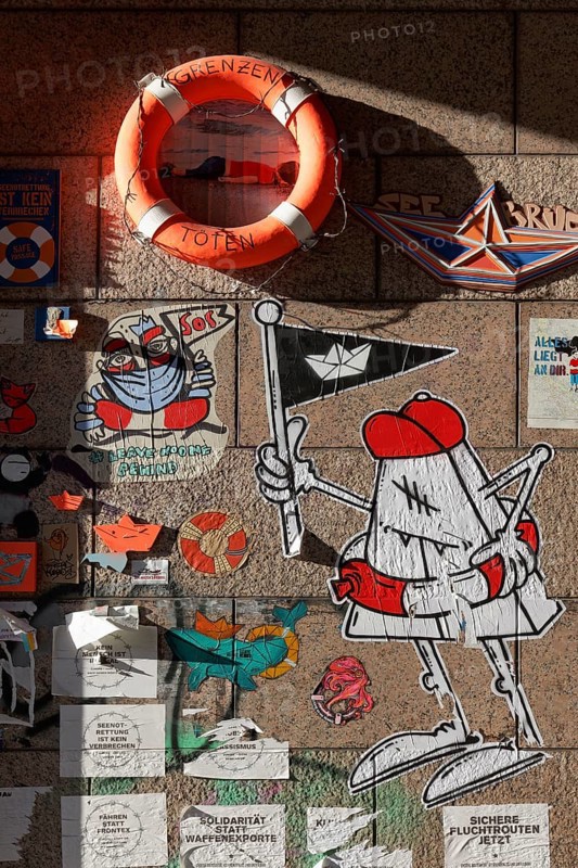 Lifebelt with writing Killing borders and paste-ups