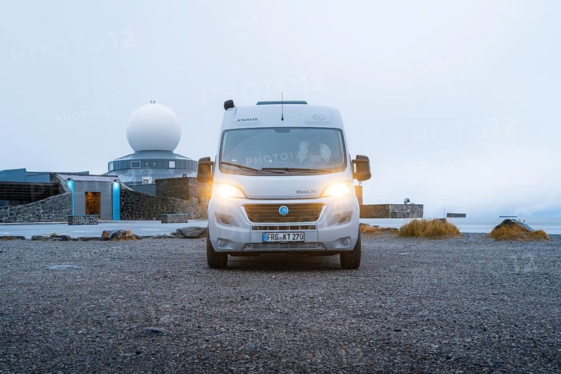 Campervan parked in front of the North Cape building