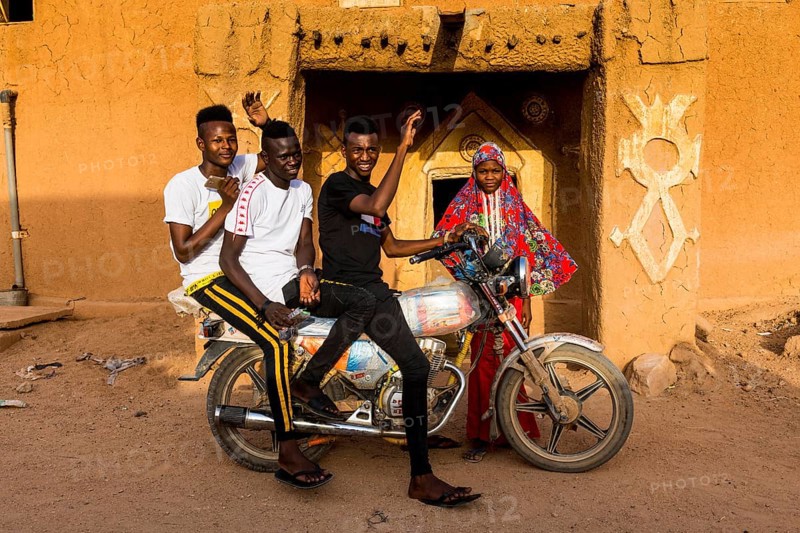 Young kids posing. Unesco world heritage sight Agadez