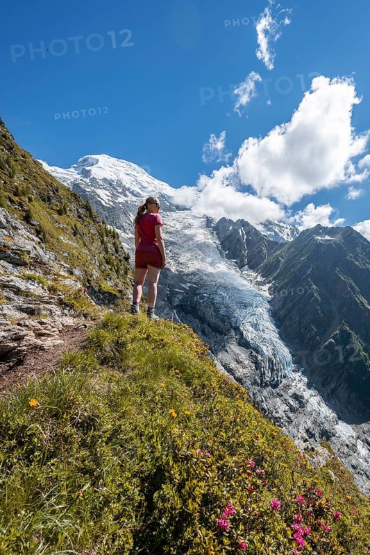 Hiker looking at mountain landscape