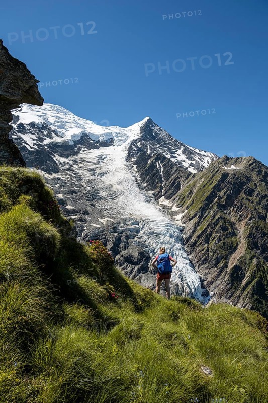 Hiker in front of mountains