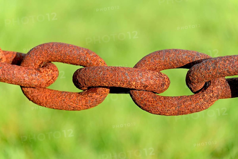 Several rusty chain links