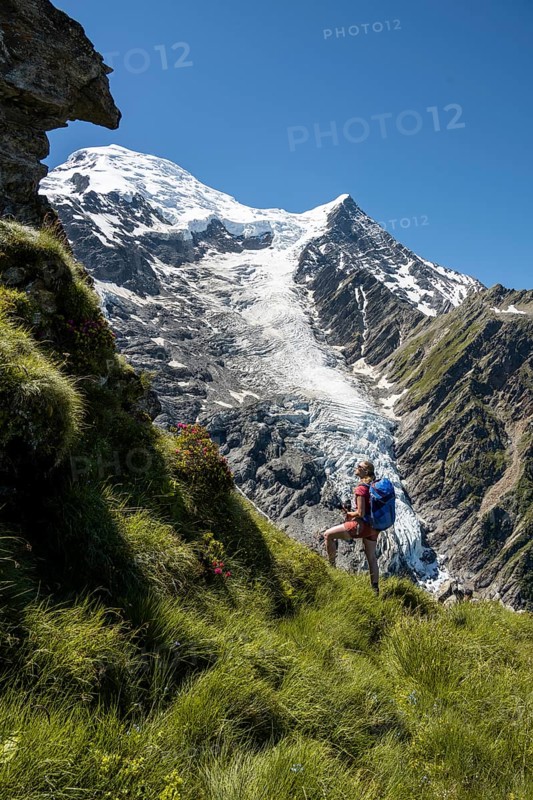 Hiker in front of glacier