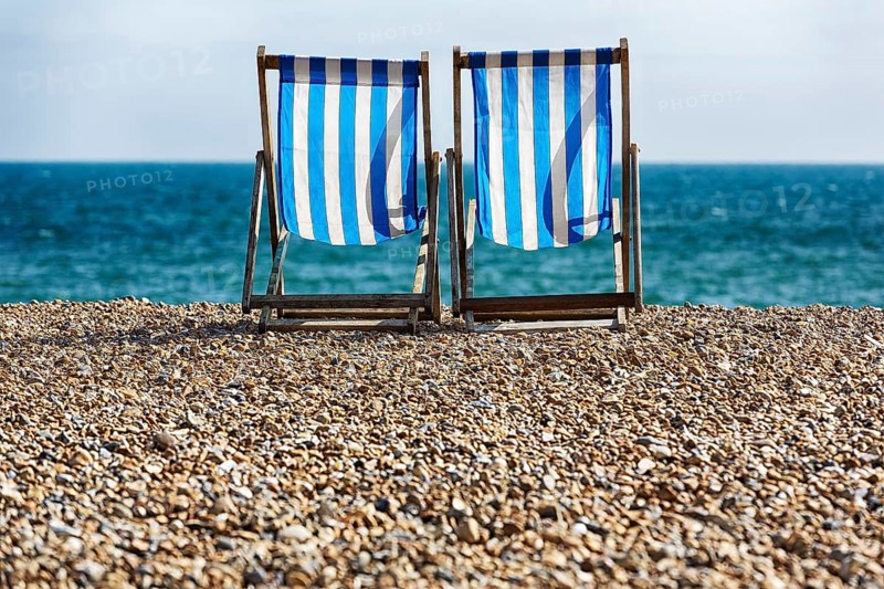 Two empty deck chairs