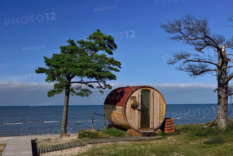 Wooden barrel as camping hut