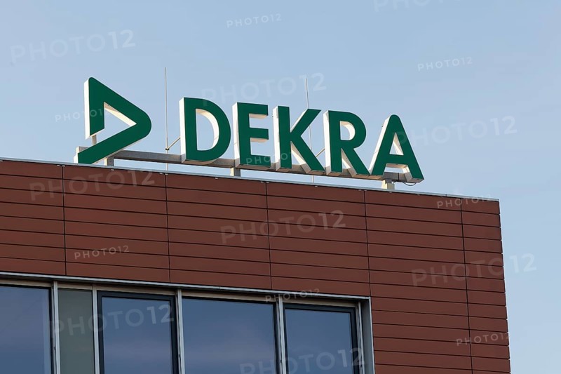 Logo of the testing company Dekra AG on the building