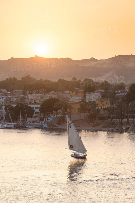 Feluccas on the river Nile at sunset