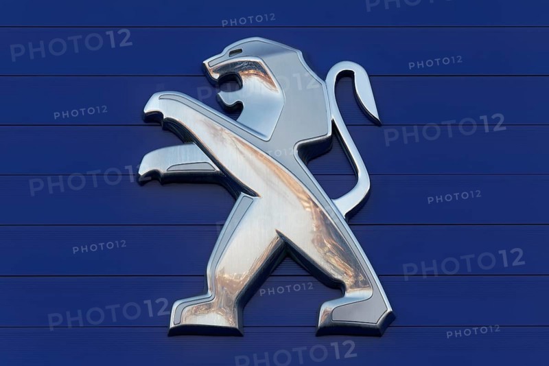 Lion from the Peugeot logo on a car dealership