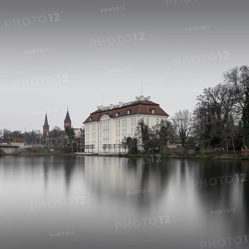View over the Dahme river to Koepenick Castle and the Long Bridge in Berlin in the morning