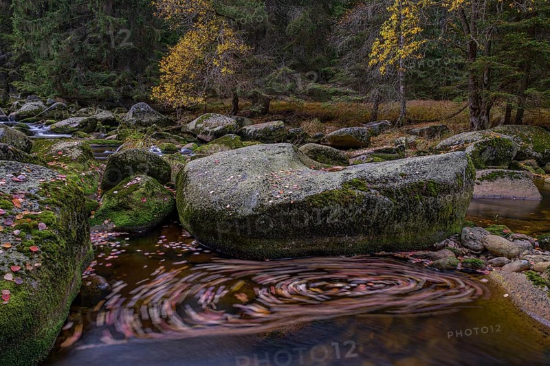 Autumn at the Vydra with huge boulders in the riverbed