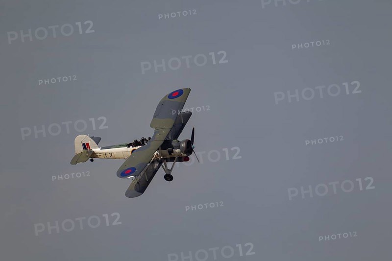 Fairey Swordfish aircraft in flight in Royal Navy markings
