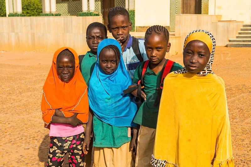 Local school children look at the camera