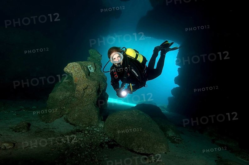 Diver in cave entrance