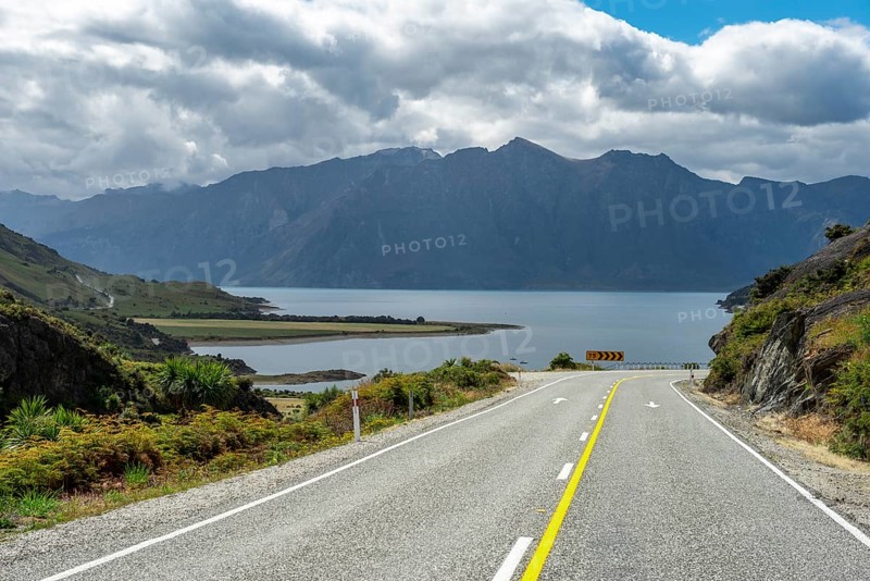 Road with views of mountains and Lake Hawea