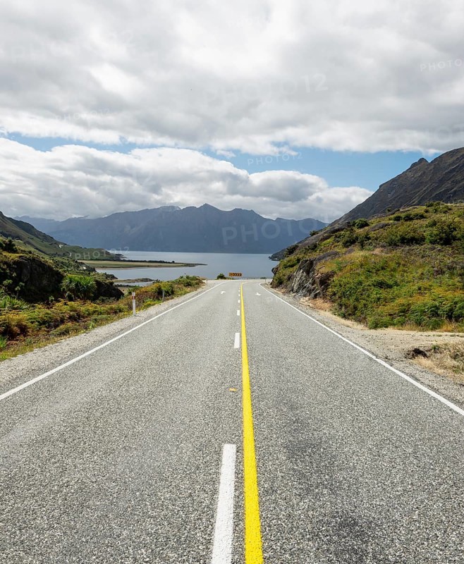 Road with views of mountains and Lake Hawea