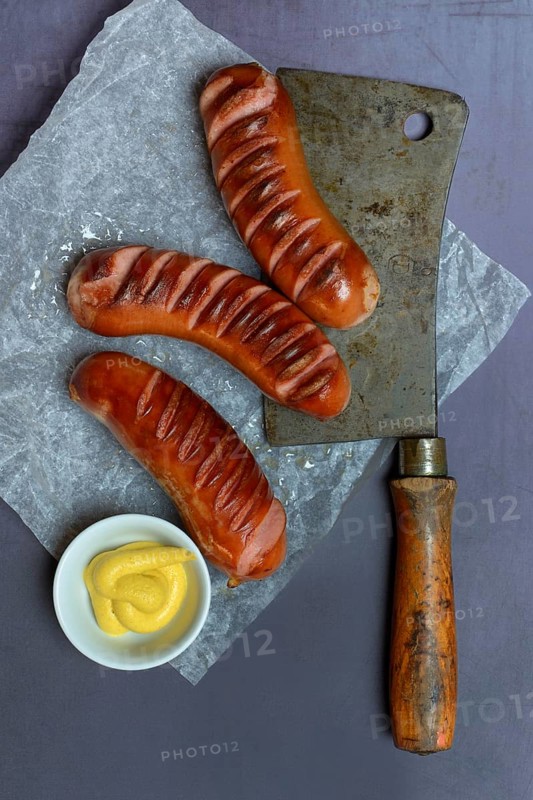 Meat sausages and skin with mustard