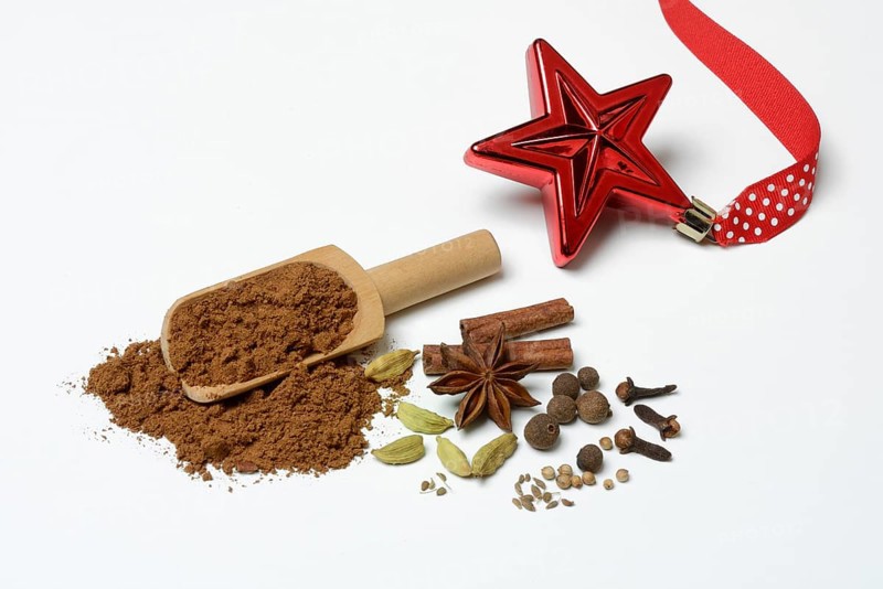 Gingerbread spice in shovel and ingredients