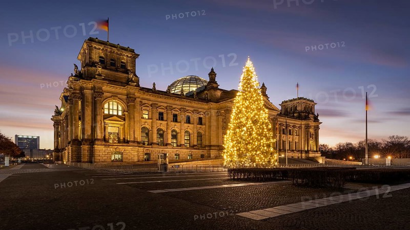Christmas tree at the Reichstag in the government district at sunrise