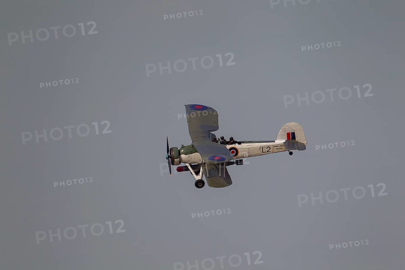 Fairey Swordfish aircraft in flight in Royal Navy markings
