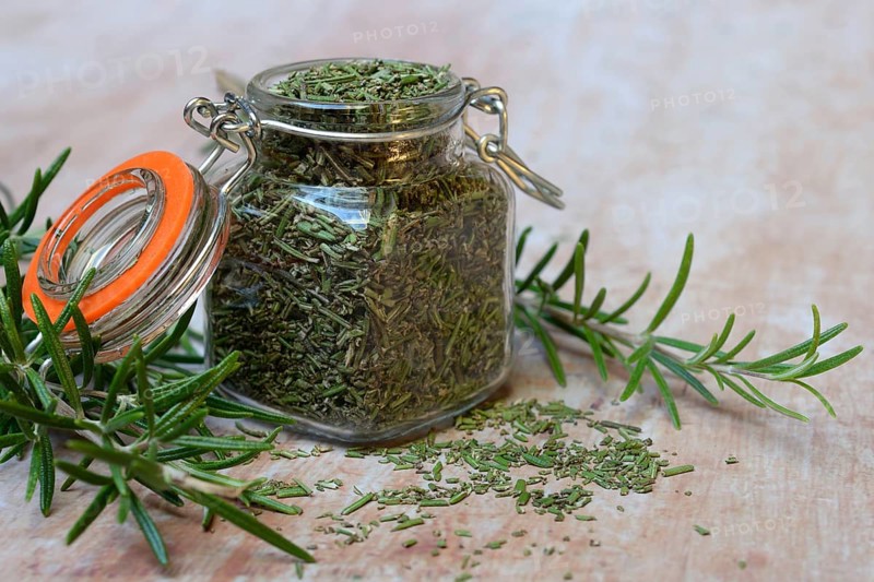Dried rosemary in glass jar