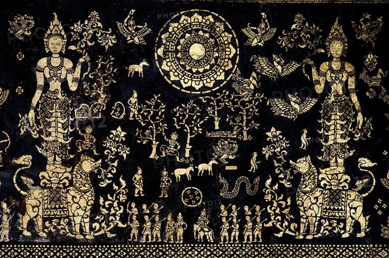 Exterior wall of the Sim prayer hall with gilded images of Apsaras