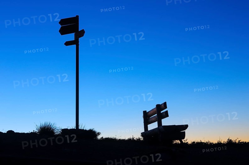 Bench and signpost