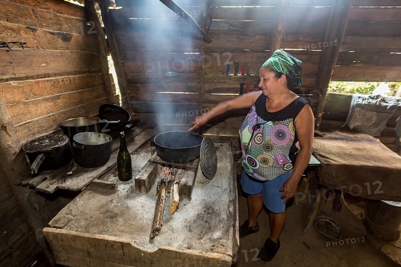 Farmer roasting coffee beans