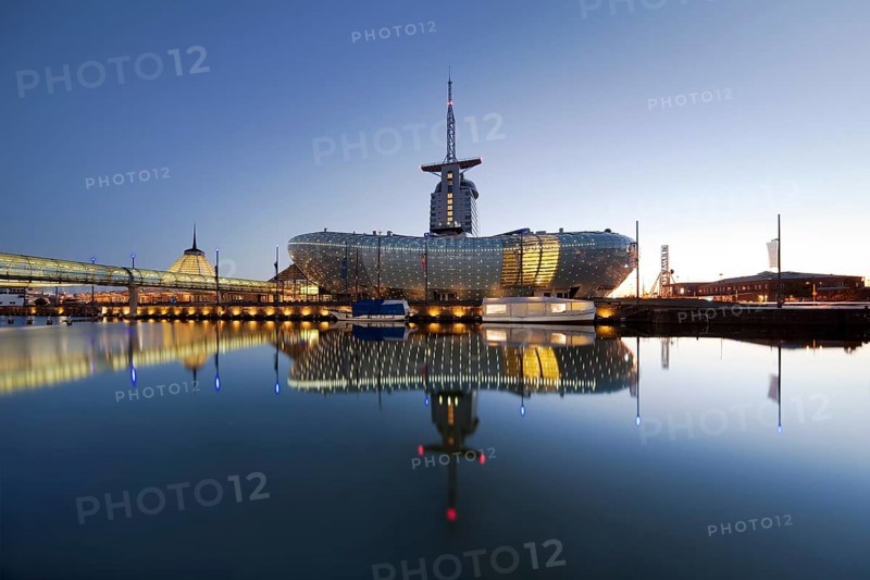 Illuminated Klimahaus Bremerhaven in the evening