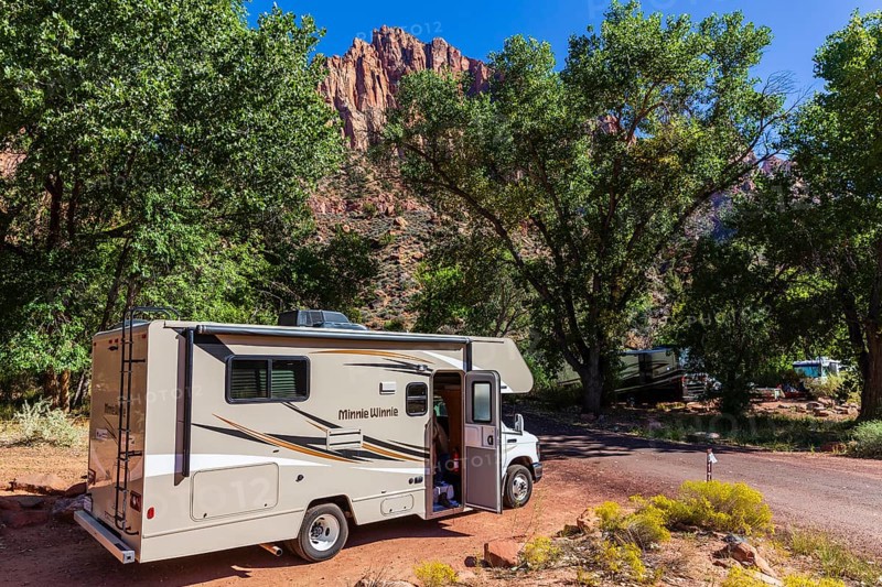 Motorhome in front of mountains at Watchman Campground