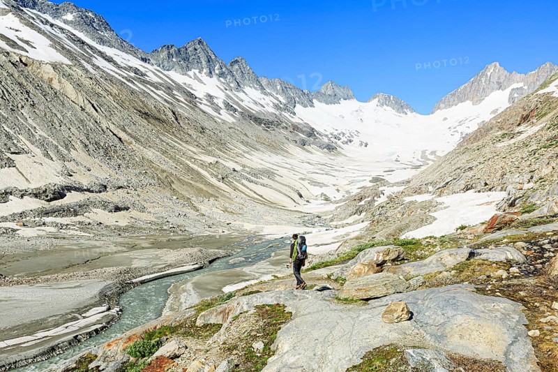 Mountaineer at the foot of the Oberaar glacier